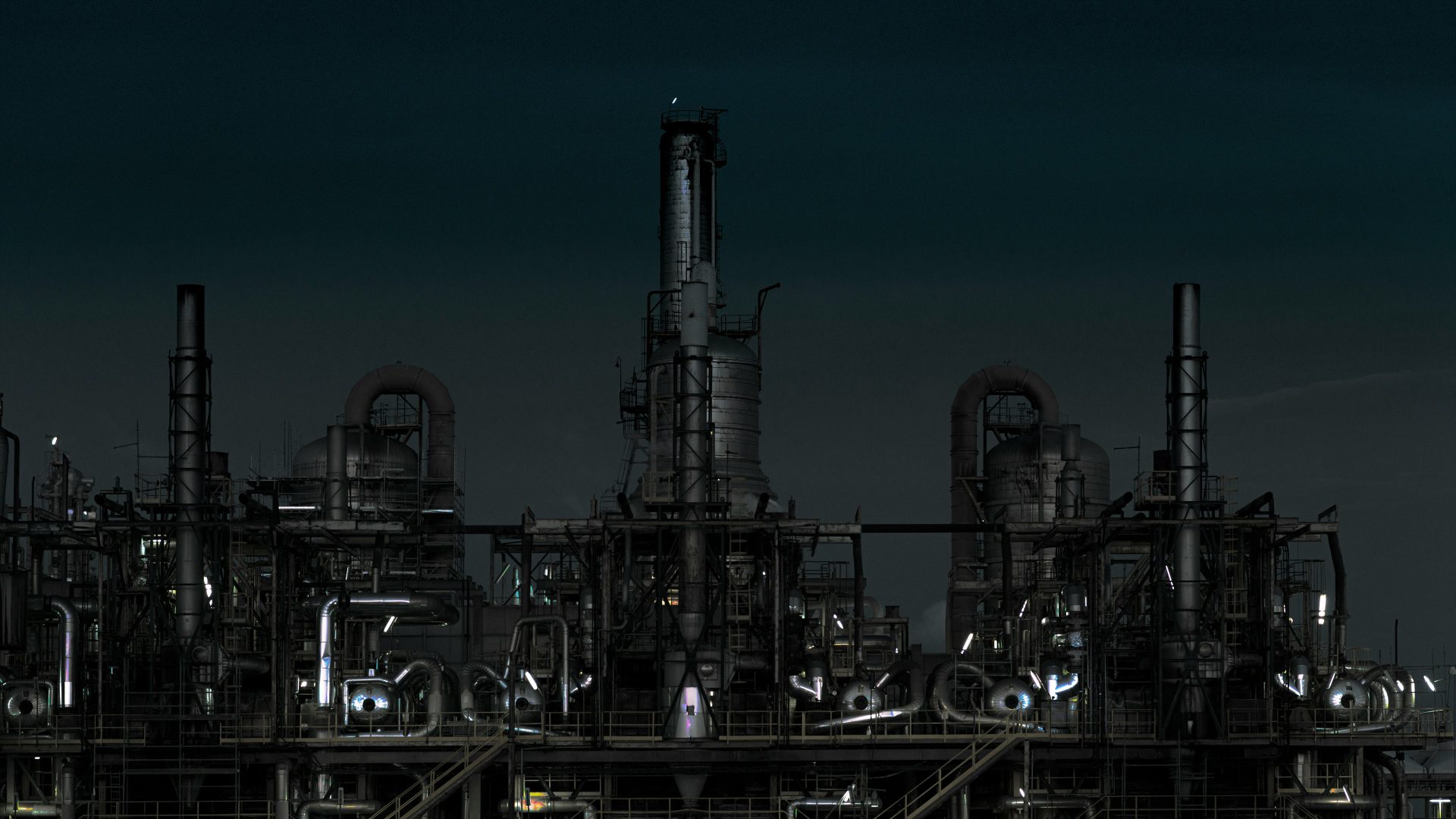 grayscale photography of factory at night